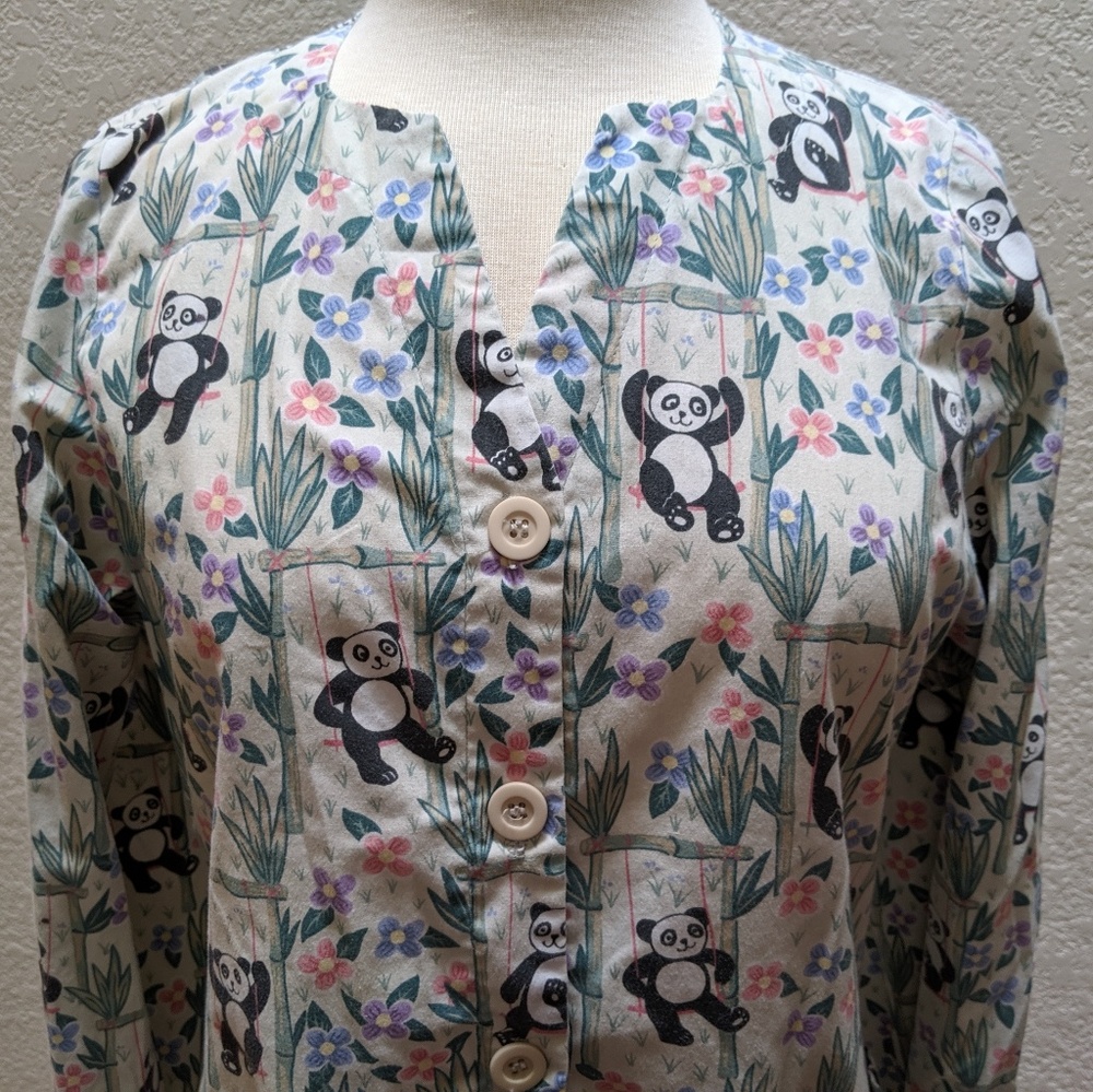 2/$17 scrub top. Long sleeve with panda. Sz XS